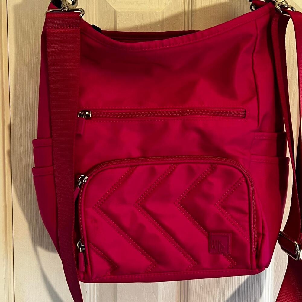 Pink crossbody bag with adjustable